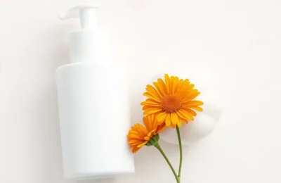 Cetaphil-style baby skincare on white marble